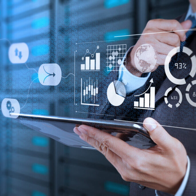 Data Management System (DMS) with Business Analytics concept. businessman working with provide information for Key Performance Indicators (KPI) and marketing analysis onn virtual computer