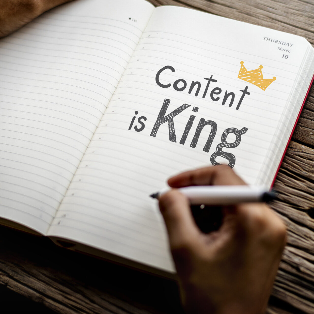 Phrase Content is king on a notebook